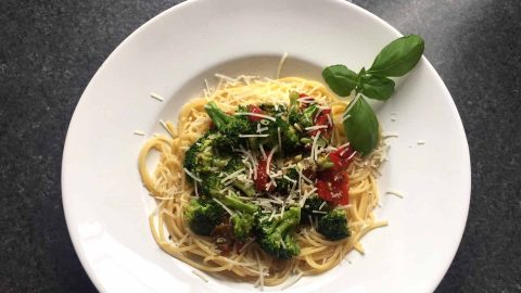 Spaghetti with broccoli and pickled peppers