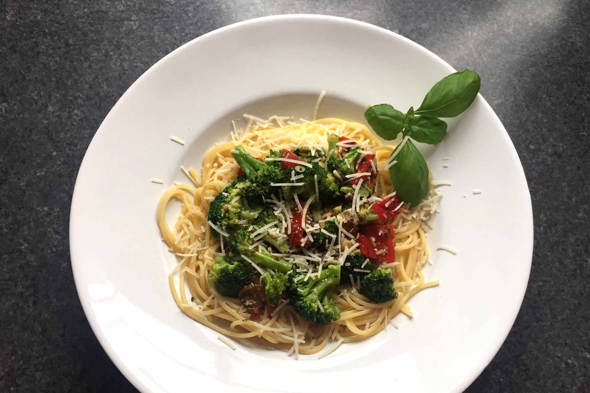 Spaghetti with broccoli and pickled peppers