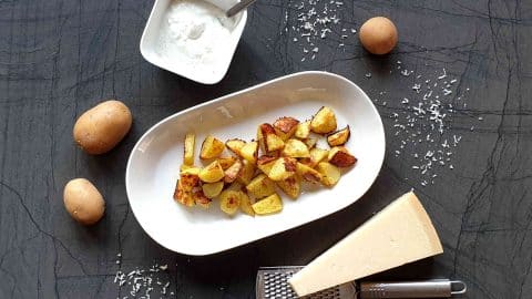 Parmesan potatoes with yogurt feta dip