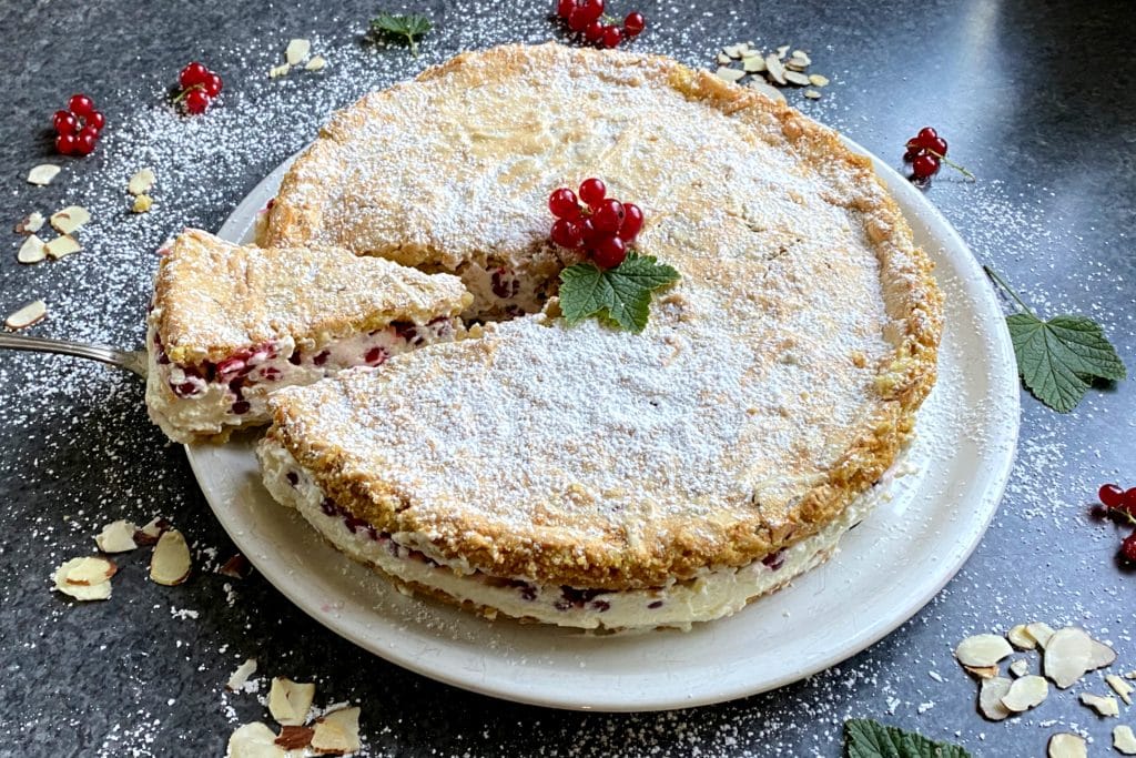 Red currant tart with meringue and almonds